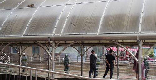 广东武警持枪围捕涉黑美籍开发商 为美国亲中侨领(组图)
